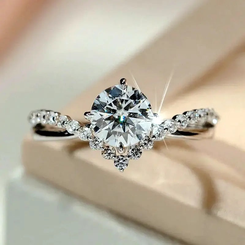 Elegant Crystal Twist Engagement Ring – Sterling Silver Plated