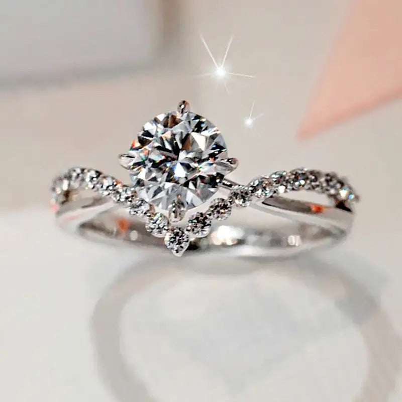 Elegant Crystal Twist Engagement Ring – Sterling Silver Plated