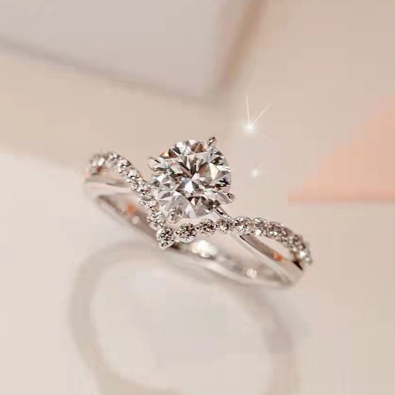 Elegant Crystal Twist Engagement Ring – Sterling Silver Plated
