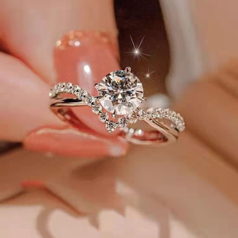 Elegant Crystal Twist Engagement Ring – Sterling Silver Plated
